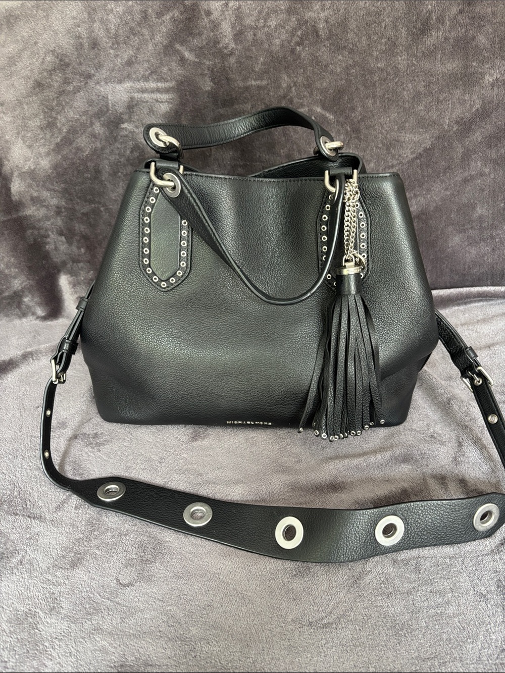 Michael Kors Black Leather Shoulder Bag with Tassel and Stud Accents